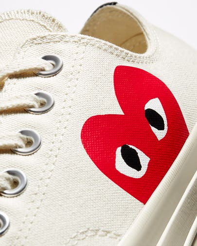 Comme des garçons play tenis resultados hotsell